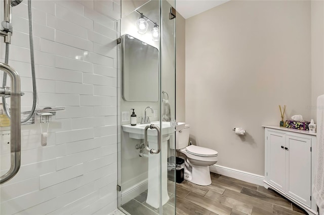 1669 Feather Grass Loop, Lutz, FL 33558 - full bath featuring a stall shower and wood finish floors