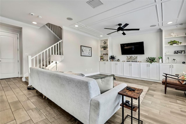 1669 Feather Grass Loop, Lutz, FL 33558 - living area with ornamental molding, ceiling fan, recessed lighting, light wood finished floors, and stairway