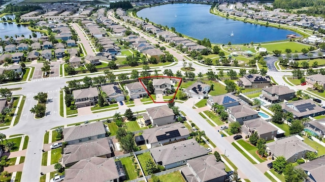 1669 Feather Grass Loop, Lutz, FL 33558 - aerial overview of property's location featuring nearby suburban area and a nearby body of water