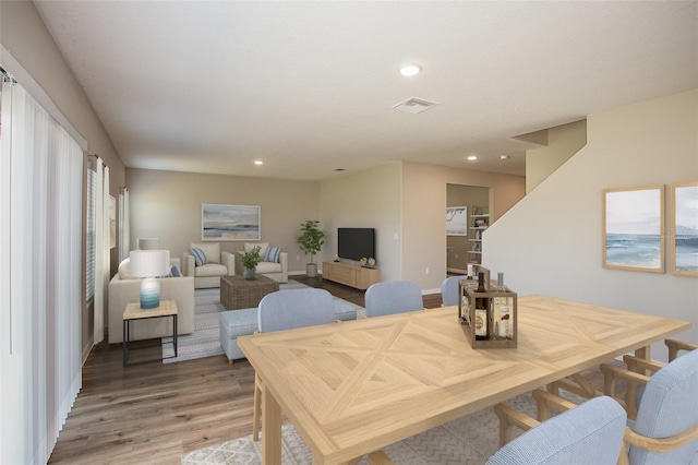 1229 Tidal St, Haines City, FL 33844 - dining room with light wood-style floors and recessed lighting