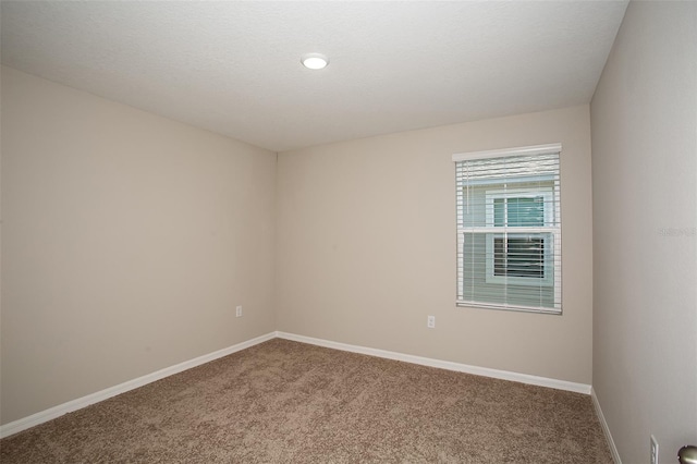 1229 Tidal St, Haines City, FL 33844 - carpeted spare room with baseboards