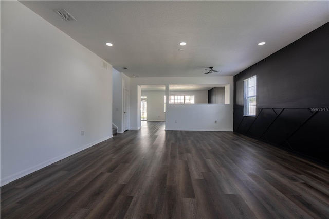 9110 Lantern Oak Way, Land O Lakes, FL 34638 - spare room with recessed lighting and dark wood-style flooring