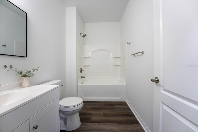 9110 Lantern Oak Way, Land O Lakes, FL 34638 - bathroom featuring vanity, wood finished floors, and bathtub / shower combination