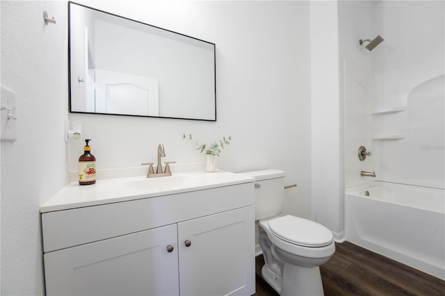 9110 Lantern Oak Way, Land O Lakes, FL 34638 - bathroom featuring wood finished floors, vanity, and tub / shower combination