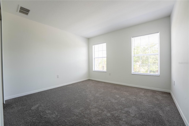 9110 Lantern Oak Way, Land O Lakes, FL 34638 - carpeted empty room with baseboards
