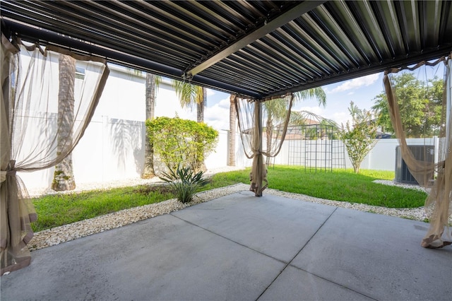9110 Lantern Oak Way, Land O Lakes, FL 34638 - fenced backyard with a patio area