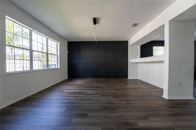 9110 Lantern Oak Way, Land O Lakes, FL 34638 - unfurnished dining area featuring dark wood finished floors and baseboards