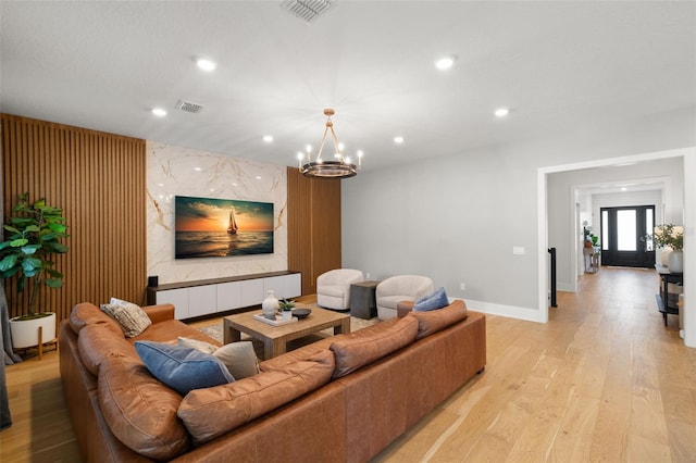 4114 W Neptune St, Tampa, FL 33629 - living area featuring recessed lighting, light wood-type flooring, and a chandelier