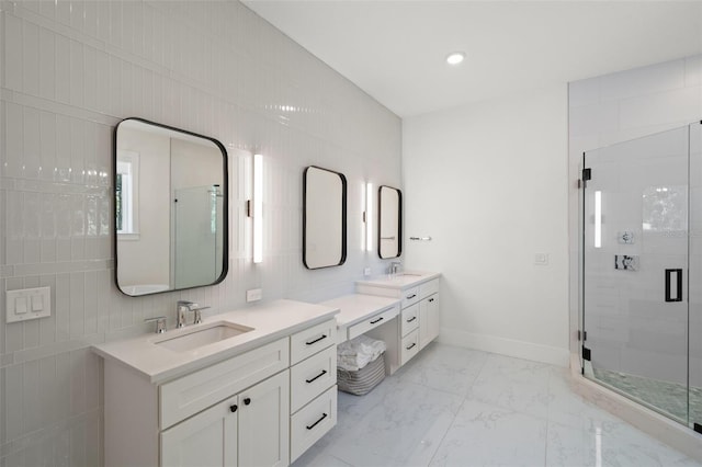 4114 W Neptune St, Tampa, FL 33629 - full bathroom featuring two vanities, a shower stall, and marble look tile flooring