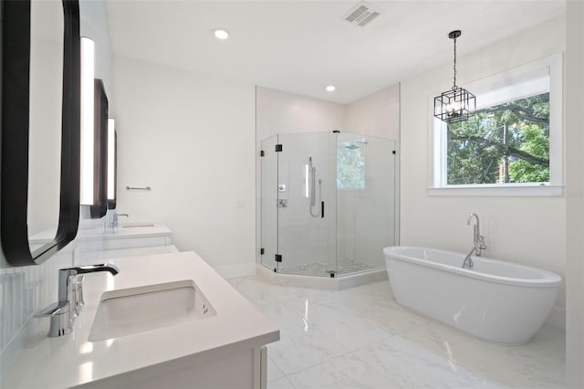 4114 W Neptune St, Tampa, FL 33629 - full bath with a shower stall, a soaking tub, double vanity, marble finish flooring, and recessed lighting