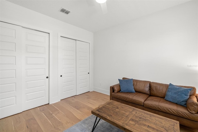 4114 W Neptune St, Tampa, FL 33629 - living area with ceiling fan and light wood-style floors