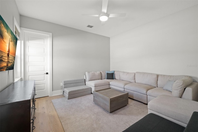 4114 W Neptune St, Tampa, FL 33629 - living room with light wood-style floors and a ceiling fan