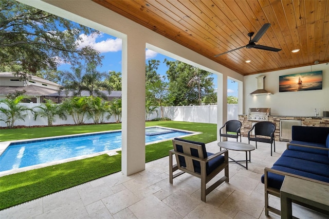 4114 W Neptune St, Tampa, FL 33629 - fenced backyard featuring an outdoor kitchen, an outdoor living space, a patio area, and ceiling fan