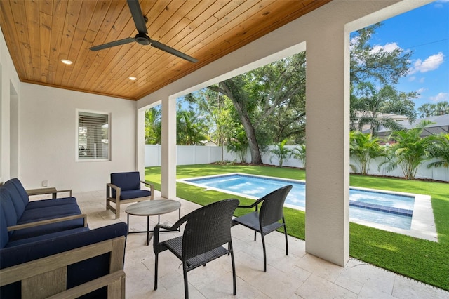4114 W Neptune St, Tampa, FL 33629 - fenced backyard featuring a patio, an outdoor living space, a ceiling fan, and an in-ground hot tub