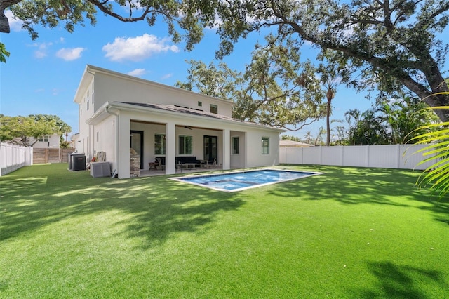 4114 W Neptune St, Tampa, FL 33629 - rear view of property featuring a fenced backyard, ceiling fan, a patio, and stucco siding