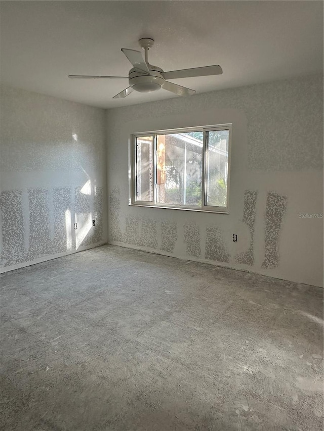 103 9th St, Belleair Beach, FL 33786 - spare room featuring ceiling fan