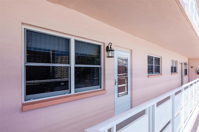 6025 Shore Blvd S Unit 408, Gulfport, FL 33707 - view of exterior entry featuring stucco siding