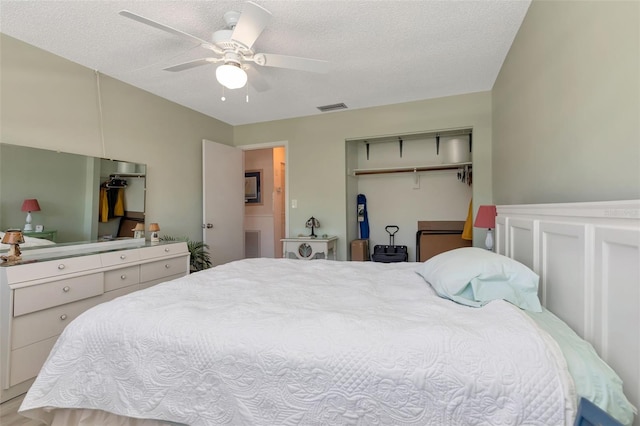 6025 Shore Blvd S Unit 408, Gulfport, FL 33707 - bedroom with a closet, ceiling fan, and a textured ceiling