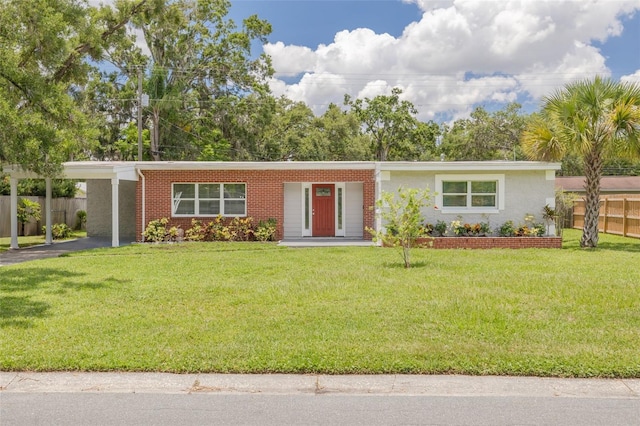505 Broxburn Ave, Temple Terrace, FL 33617 - view of front of property featuring a carport, asphalt driveway, and brick siding