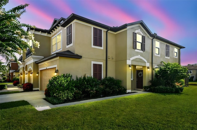 11519 Crowned Sparrow Ln, Tampa, FL 33626 - multi unit property featuring a garage, stucco siding, and a front lawn