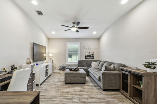 11519 Crowned Sparrow Ln, Tampa, FL 33626 - living room featuring ceiling fan, light wood-style floors, and recessed lighting