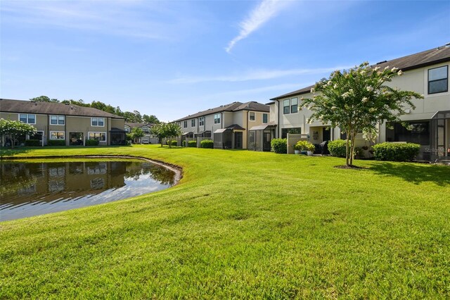 11519 Crowned Sparrow Ln, Tampa, FL 33626 - surrounding community featuring a residential view, a water view, and a yard