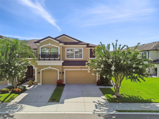 11519 Crowned Sparrow Ln, Tampa, FL 33626 - view of front of home with a garage, driveway, stucco siding, a balcony, and a front lawn