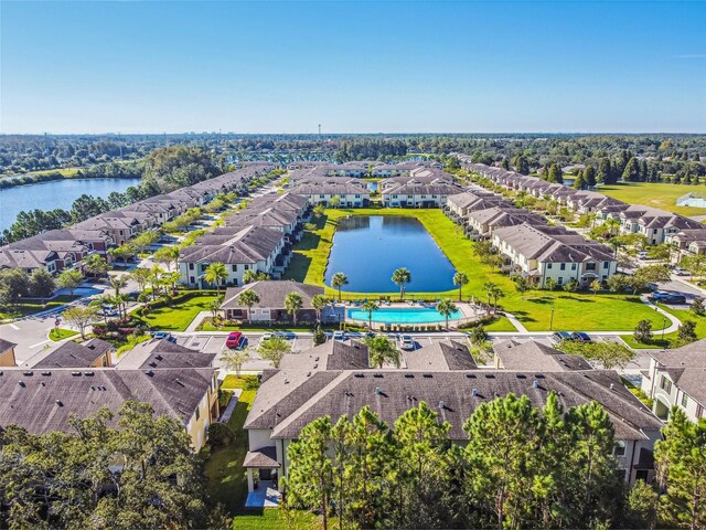 11519 Crowned Sparrow Ln, Tampa, FL 33626 - aerial perspective of suburban area with a nearby body of water