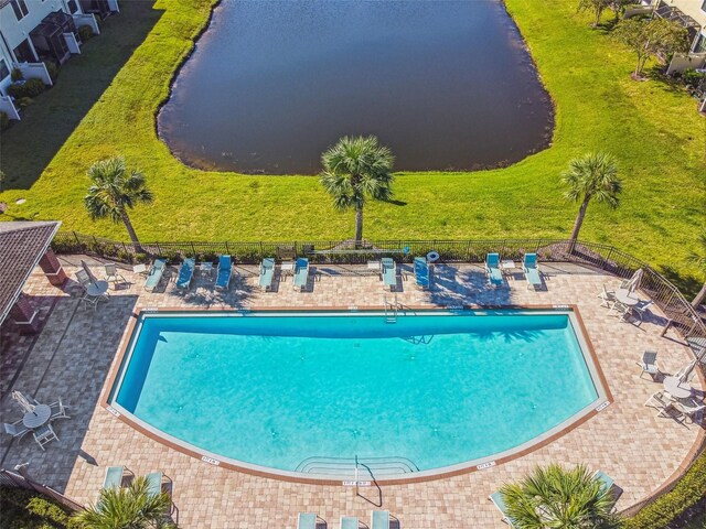 11519 Crowned Sparrow Ln, Tampa, FL 33626 - community pool with a patio and a water view