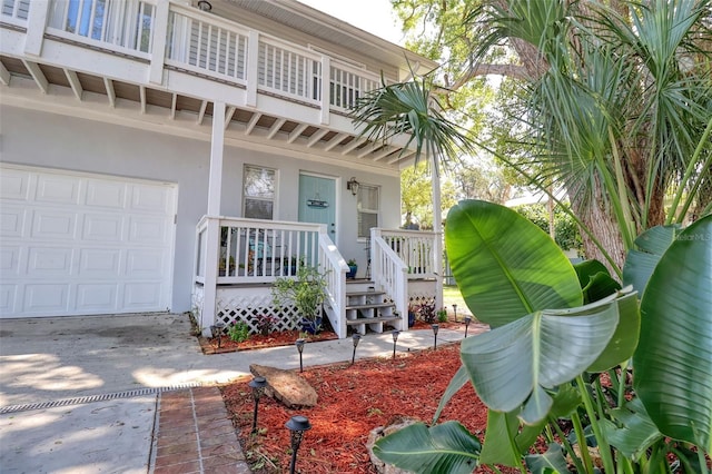 408 Georgia Ave, Crystal Beach, FL 34681 - doorway to property with a porch and stucco siding