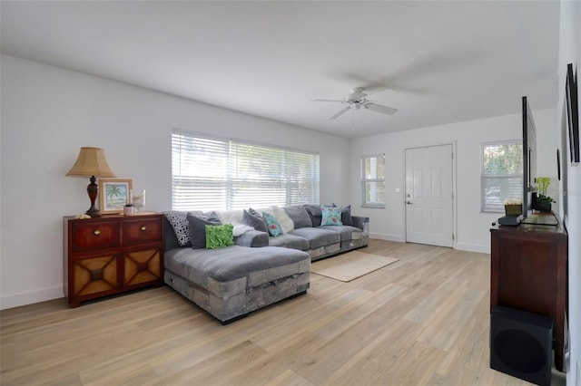 408 Georgia Ave, Crystal Beach, FL 34681 - living room with plenty of natural light, light wood-style floors, and ceiling fan