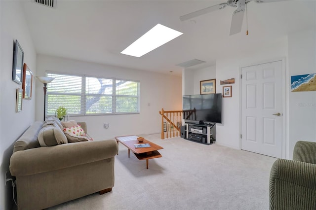 408 Georgia Ave, Crystal Beach, FL 34681 - living room with a skylight, light carpet, and a ceiling fan