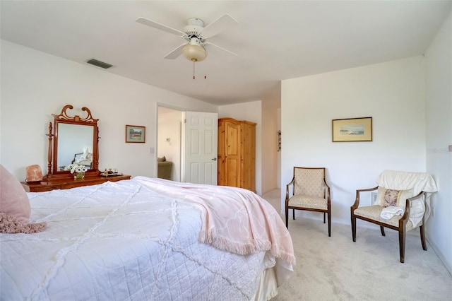 408 Georgia Ave, Crystal Beach, FL 34681 - bedroom with light colored carpet and ceiling fan