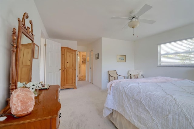 408 Georgia Ave, Crystal Beach, FL 34681 - bedroom with light carpet and a ceiling fan