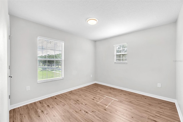 10523 Boyette Creek Blvd, Riverview, FL 33569 - unfurnished room featuring wood finished floors and baseboards