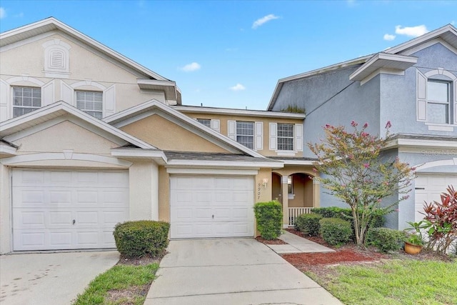9907 Carlsdale Dr, Riverview, FL 33578 - multi unit property featuring stucco siding, concrete driveway, and a garage