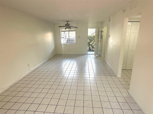 6342 Newtown Cir Unit A4, Tampa, FL 33615 - empty room with light tile patterned floors and ceiling fan