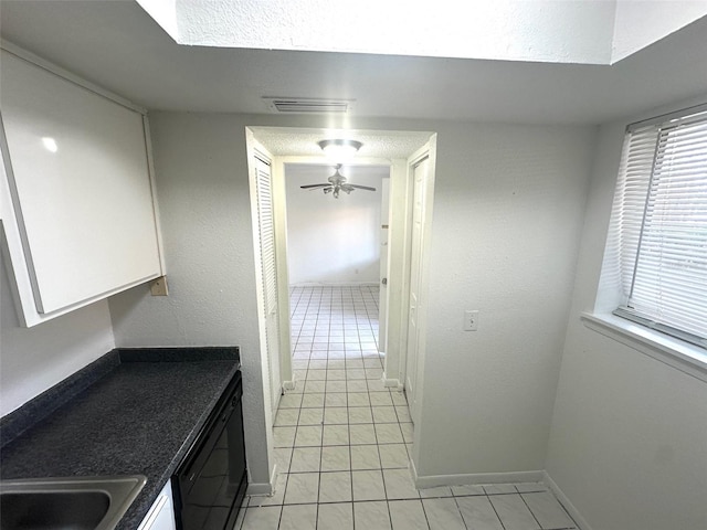 6342 Newtown Cir Unit A4, Tampa, FL 33615 - hallway with light tile patterned flooring and baseboards