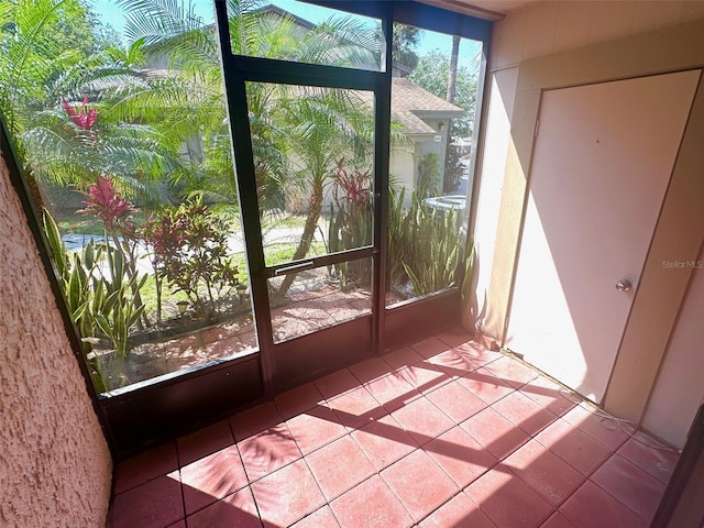 6342 Newtown Cir Unit A4, Tampa, FL 33615 - unfurnished sunroom featuring tile patterned flooring
