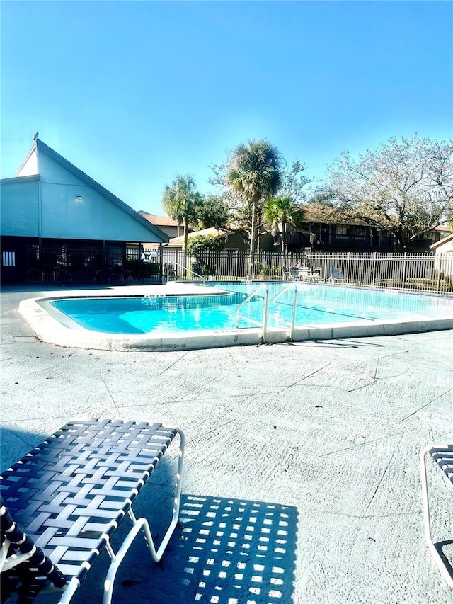 6342 Newtown Cir Unit A4, Tampa, FL 33615 - community pool featuring a patio