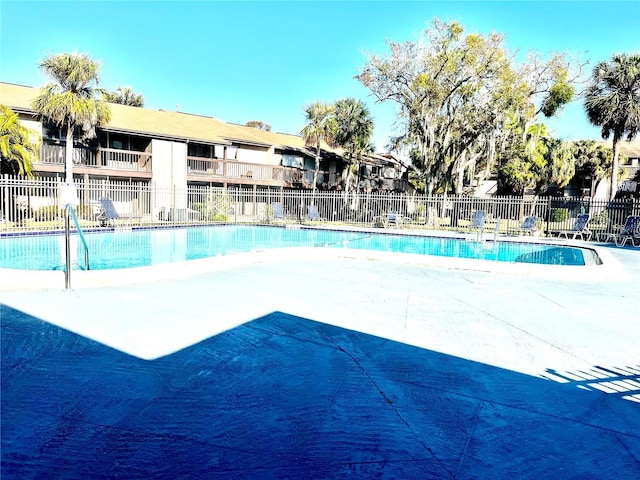 6342 Newtown Cir Unit A4, Tampa, FL 33615 - community pool featuring a patio