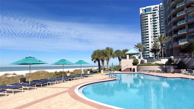 1540 Gulf Blvd Unit 2107, Clearwater Beach, FL 33767 - community pool with a gazebo, a patio area, and view of water and beach