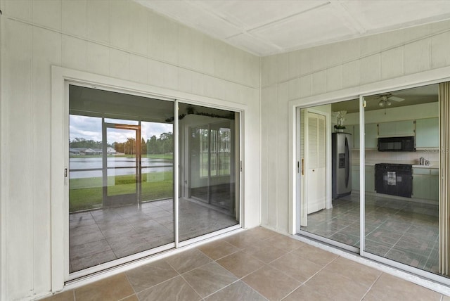 1741 Elk Spring Dr, Brandon, FL 33511 - unfurnished sunroom featuring a water view and a sink