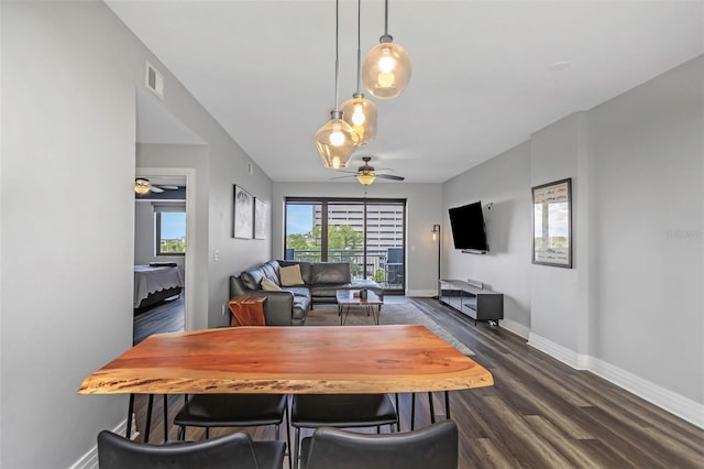1108 N Franklin St Unit 602, Tampa, FL 33602 - dining room featuring ceiling fan and dark wood-style flooring