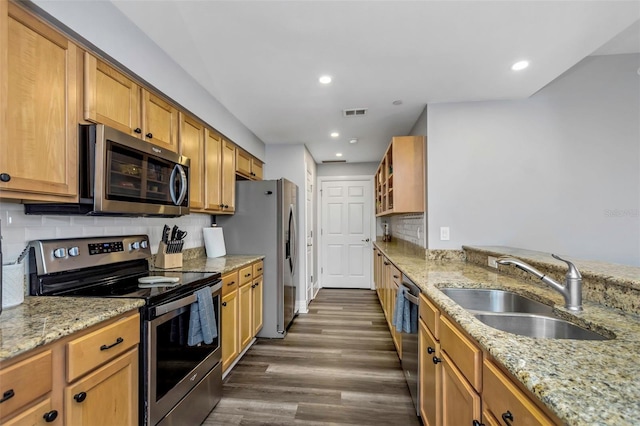 1108 N Franklin St Unit 602, Tampa, FL 33602 - kitchen with stainless steel appliances, dark wood-style floors, recessed lighting, light stone countertops, and backsplash