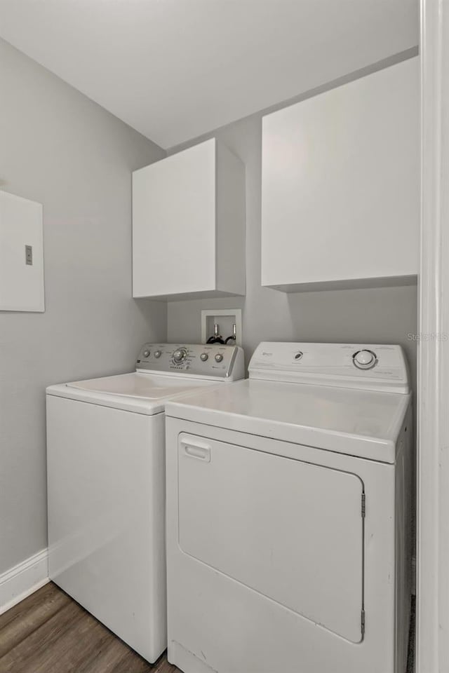 1108 N Franklin St Unit 602, Tampa, FL 33602 - laundry room with washer and dryer and wood finished floors