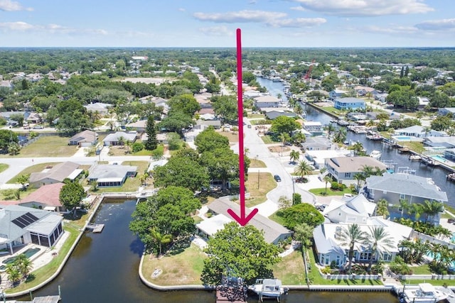 336 Westwinds Cir, Palm Harbor, FL 34683 - aerial view of residential area with a nearby body of water