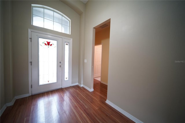12721 Avelar Creek Dr, Riverview, FL 33578 - entryway with dark wood-style flooring and baseboards