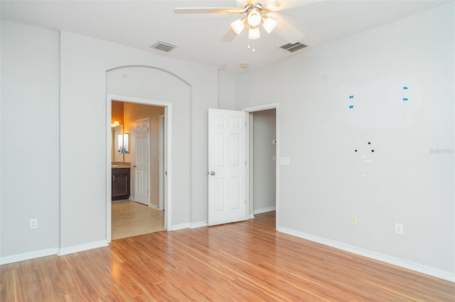 12721 Avelar Creek Dr, Riverview, FL 33578 - spare room with ceiling fan and light wood-style flooring