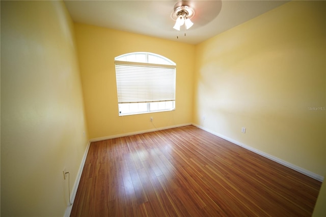 12721 Avelar Creek Dr, Riverview, FL 33578 - empty room featuring a ceiling fan and wood finished floors